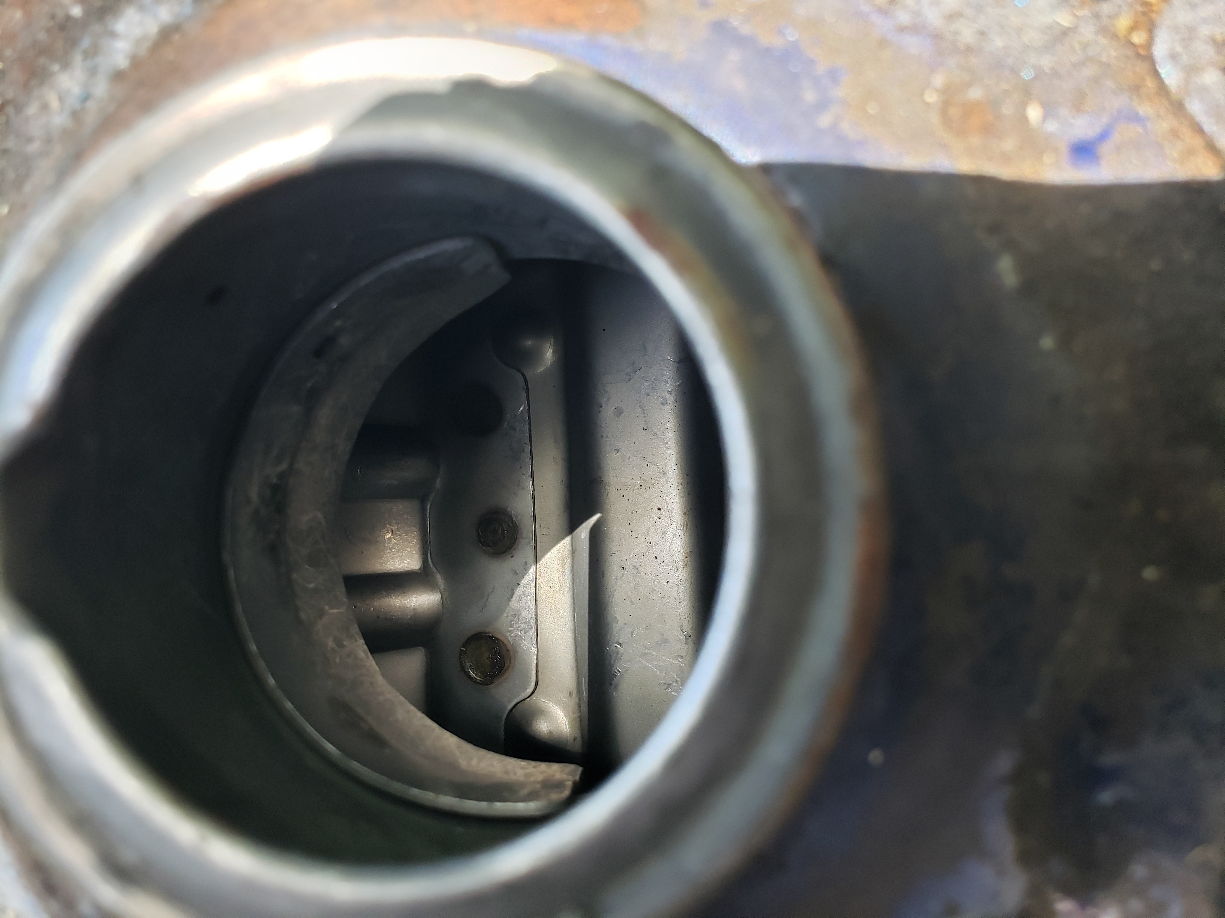 Looking down into the gas tank filler neck